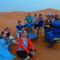 Enjoy Moda Camp Merzouga tours- Camel sunset sunrise Quad Sunboarding ATV