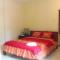 Griya Gribig Guest House Mitra RedDoorz - Malang