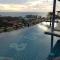 Sea and Sky Condominium Room #406