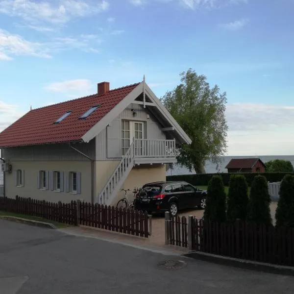 Namelis prie marių, viešbutis mieste Nida