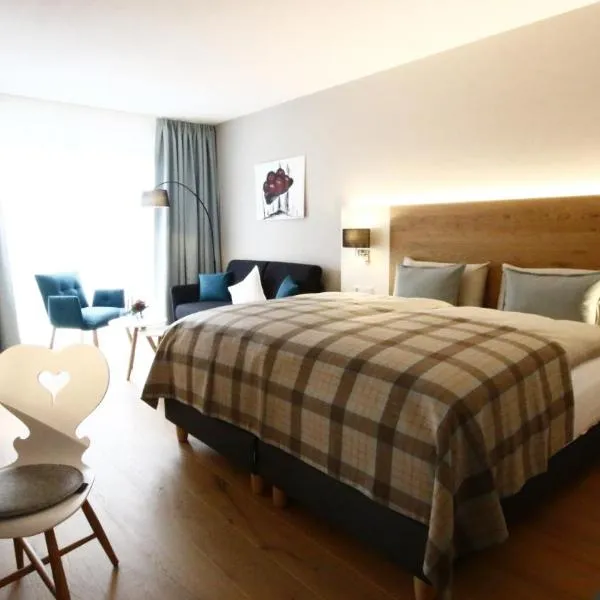 Gästezimmer Kamino: Häusern şehrinde bir otel