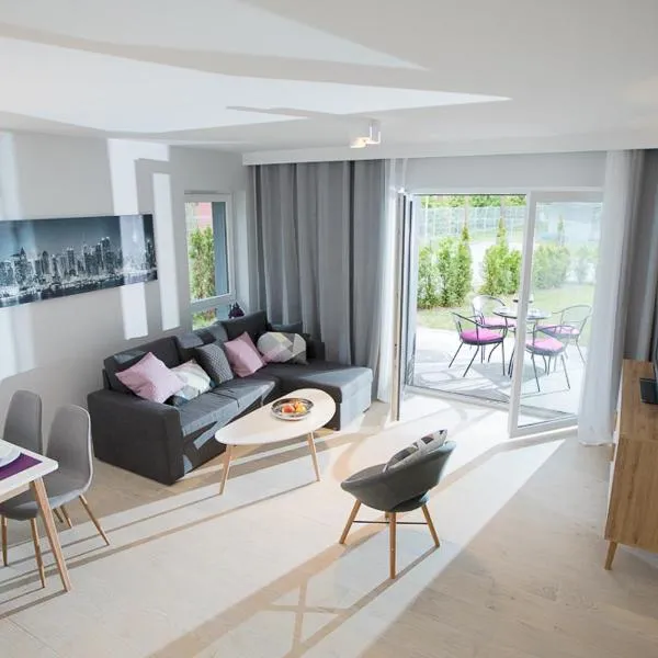 Apartament wrzos z ogródkiem, ξενοδοχείο σε Pogorzelica