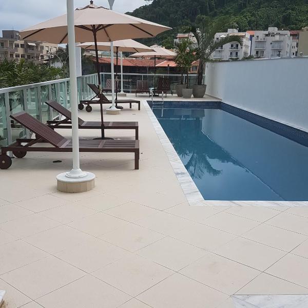 Apartamento em Ubatuba - Praia Grande com Wifi gratuito, rede de proteção e todo conforto que você merece