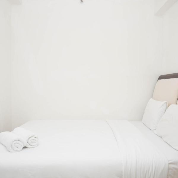 Spacious 2BR Green Bay Pluit Apartment By Travelio