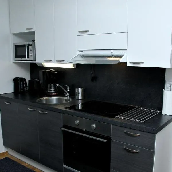 Kotimaailma Apartments Joensuu - Koulukatu 21, hotel v destinaci Joensuu