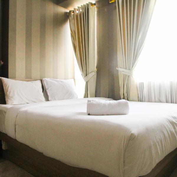 1BR with Extra Balcony The Oasis Cikarang Apartment By Travelio