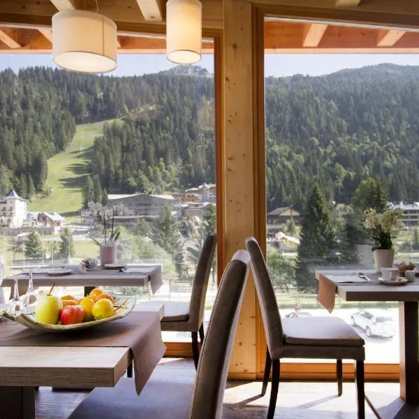 Hotel Garnì Caminetto, hotel a Madonna di Campiglio