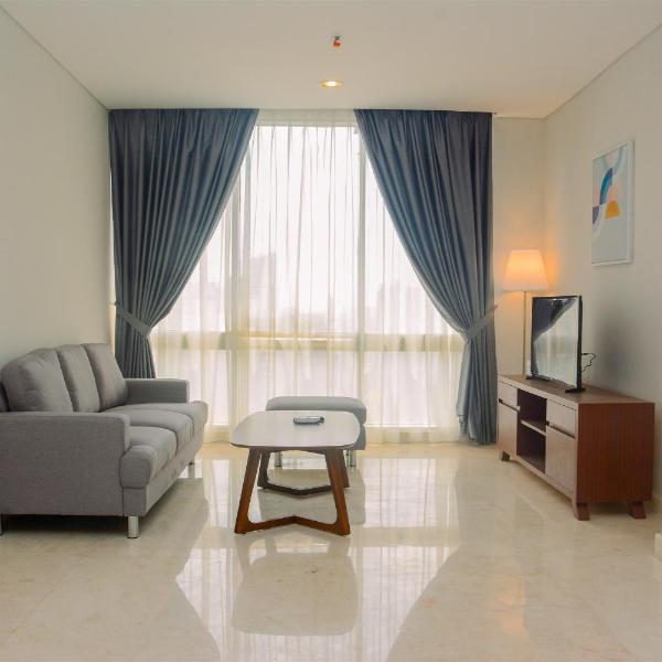 Comfy and Spacious 2BR The Masterpiece Epicentrum Apartment By Travelio