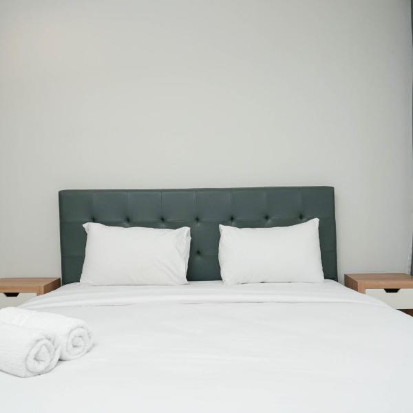 Cozy 2BR at Empyreal Epicentrum Apartment By Travelio