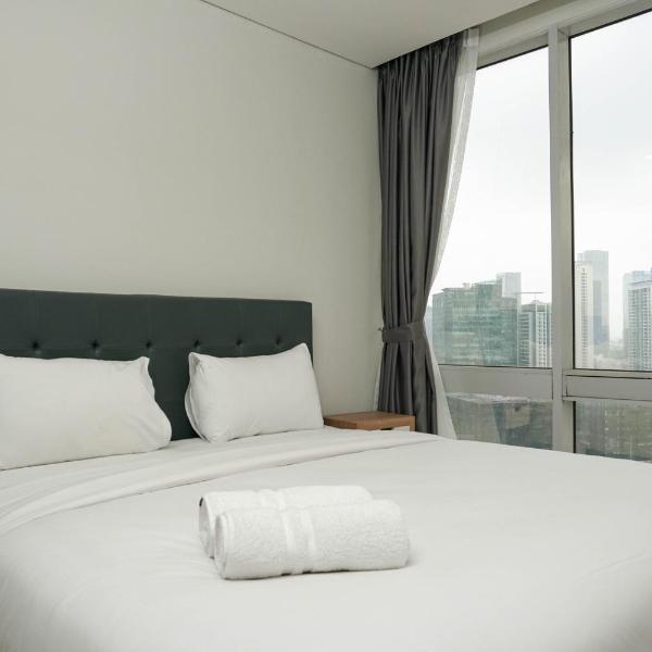 Comfortable Deluxe 2BR at The Empyreal Condominium Epicentrum Apartment By Travelio