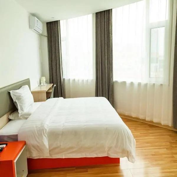 7Days Inn Dongying Taihangshan Road Business Park Branch, хотел в Дуньин