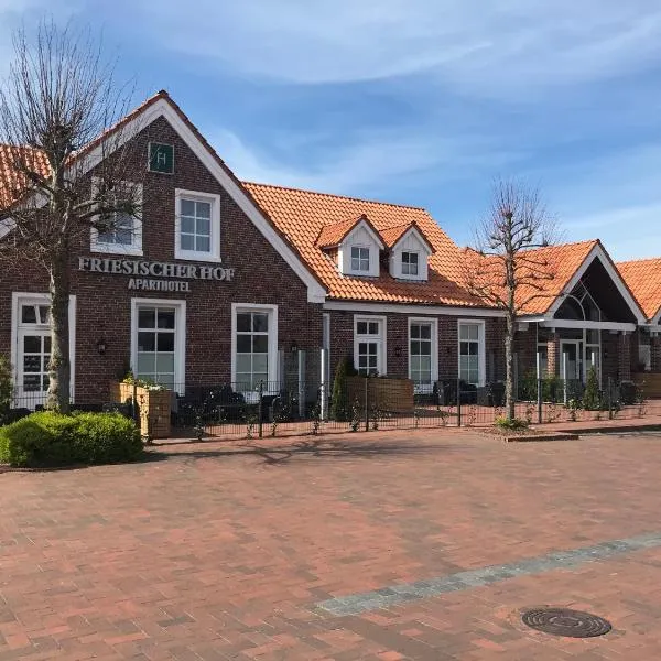 Friesischer Hof, Ferienwohnungen mit Indoor Spielplatz, kostenfreien Parkplatz und W-Lan, hotel in Hage