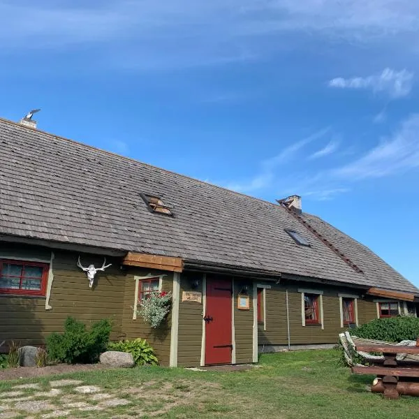 Muha Beach Holiday Home, hotel i Riksu