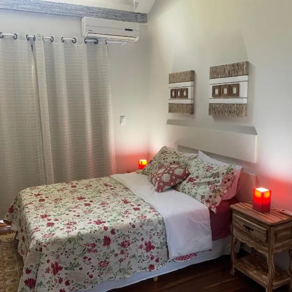 Chalé aconchegante para família no Centro, hotel in Penedo