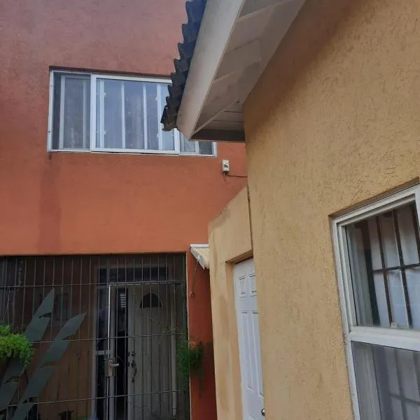 Oasis Realm, hotel i Kingston