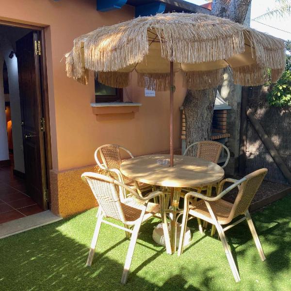 Estudio para pareja con jardincito privado barbacoa con piscina compartida