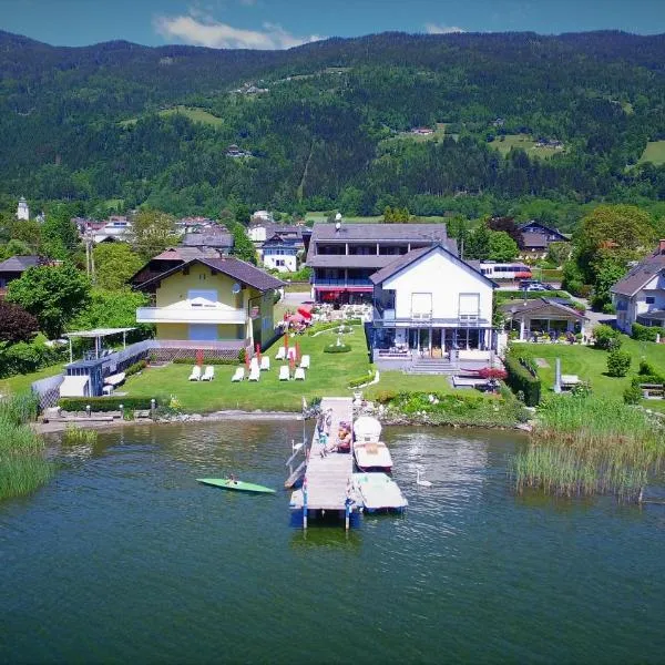 Seehaus "Kärnten Inn" mit direktem Seezugang und E-Ladestation, hotel u gradu Bodensdorf