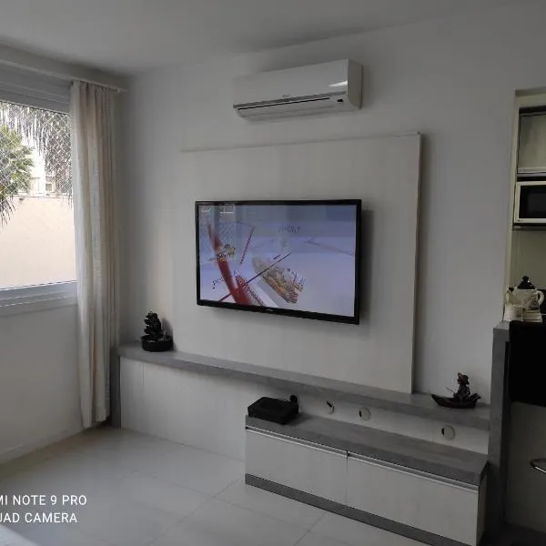 Lindo apartamento ao lado do Park Shopping Canoas, hôtel à Canoas