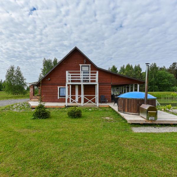 Private house surrounded by woods and lake