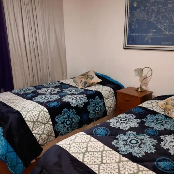 Alojamiento familiar, habitación o departamento，位于伊基克的酒店