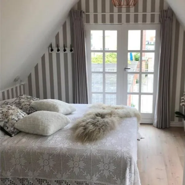 Penthouselejlighed med havneudsigt、カーテミンドのホテル