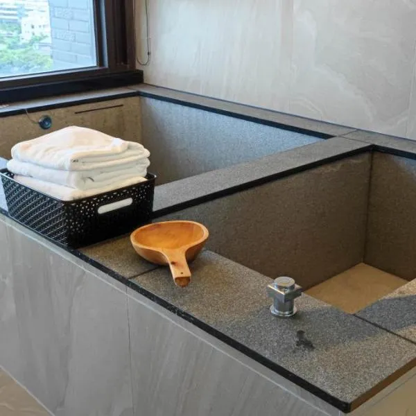 晨曦溫泉宅, hotel din Toucheng