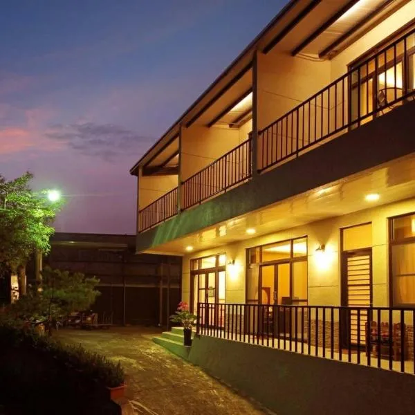 Qian's Garden Inn, hotell i Lugu