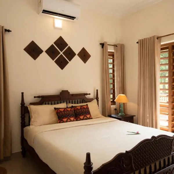 POOTHALI HOMESTAY, hotel em Nīleshwar