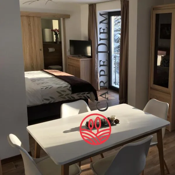 Apartamenty Carpe Diem, מלון באוסטרון