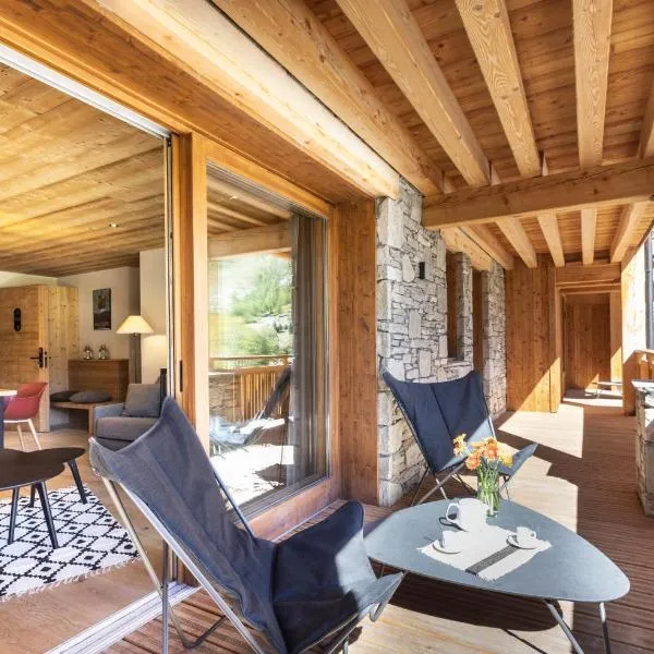 Chalet Hôtelier LES EQUINOXES - VAL D'ISERE、La Dailleのホテル