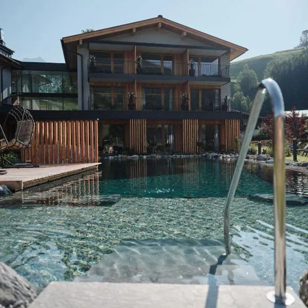 Wellness und Brunch Hotel MorgenZeit beheizter Naturpool mit Sandstrand Genuss Frühstück bis 13 Uhr Hochkönig Sommercard, hotel v destinaci Maria Alm am Steinernen Meer