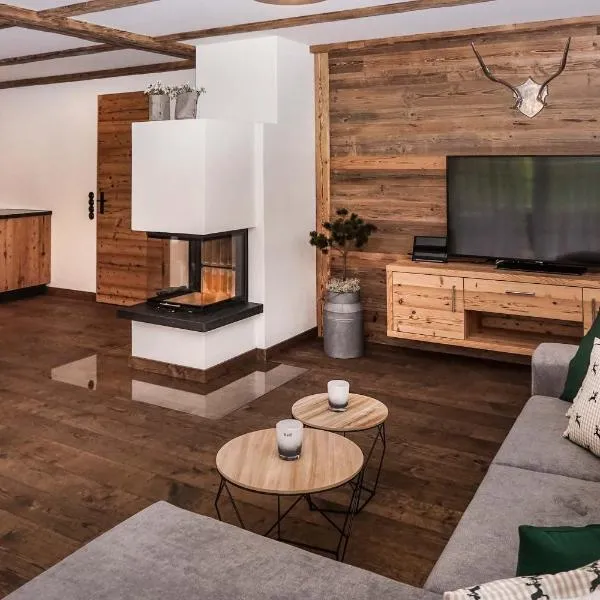 Alpin Lodges - Moderne Appartements mit Zugang zu 3000 qm SPA Panoramahotel Oberjoch, hotel in Bad Hindelang
