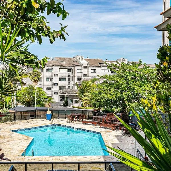 Apto com sacada e churrasq 260m Praia Brava COI302, hotel em Florianópolis
