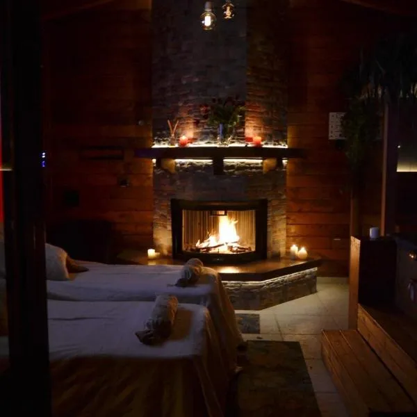 Mini spa in chalet bosco e trullo, hotel in Cisternino