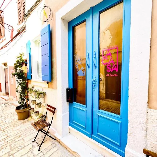 Rooms & Apartments La Casa di Loreto，位于罗维尼的酒店