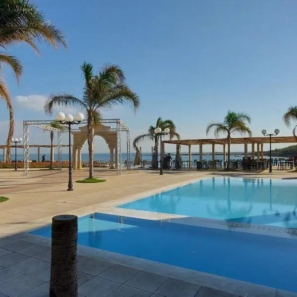 Aquarius Touristic Resort, מלון בAl Minyah