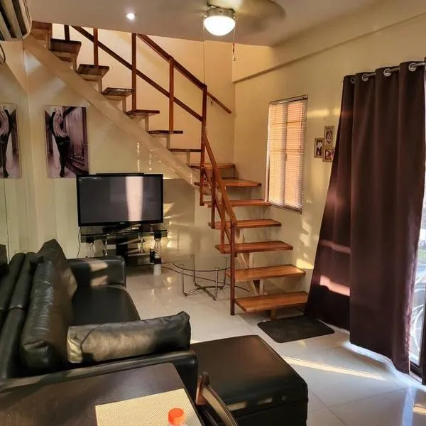 Sheryll Escapes - Kandi Resort-type Spacious 1 BR loft with Netflix and free Housekeeping, hotel in Angeles