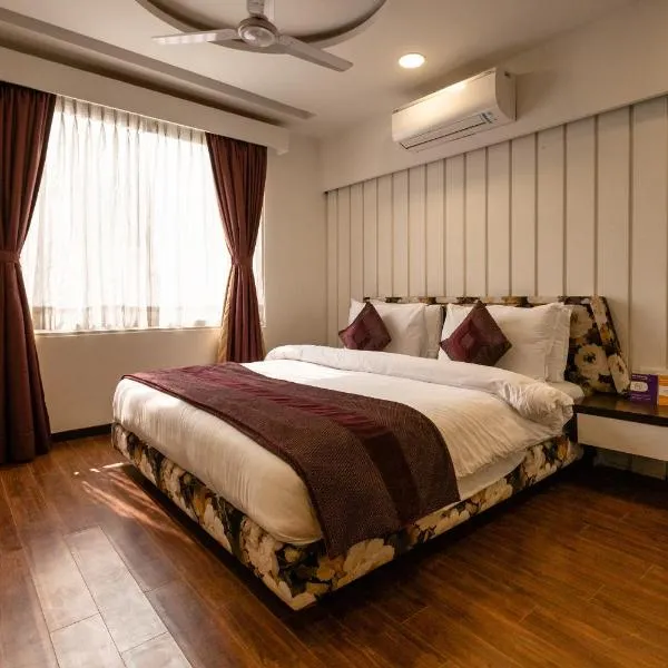 Clubhouse Nami Residency - Sabarmati Riverfront Ahmedabad, hotel in Ahmedabad