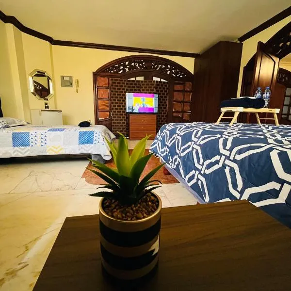 Mega Suite junto al San Marino Shopping, hotel en Guayaquil