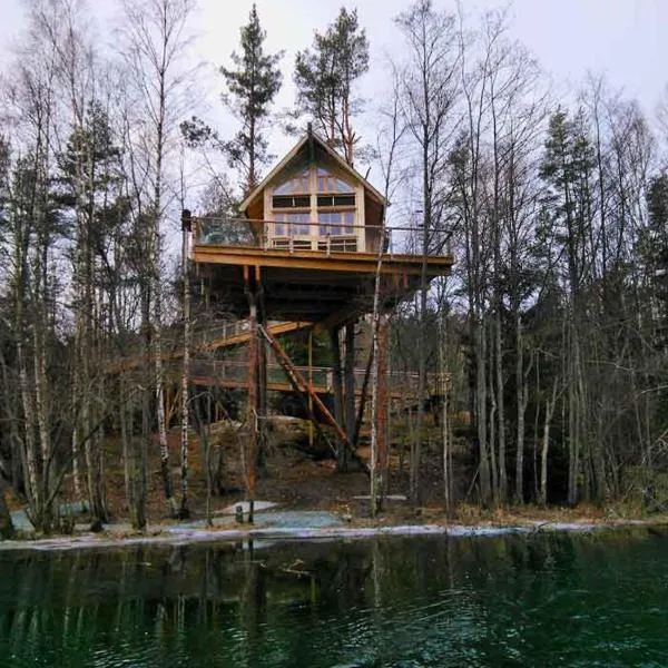 Tretopphytter På Grensen - Beverhytta med robåt og gjeddefiske, hôtel à Halden