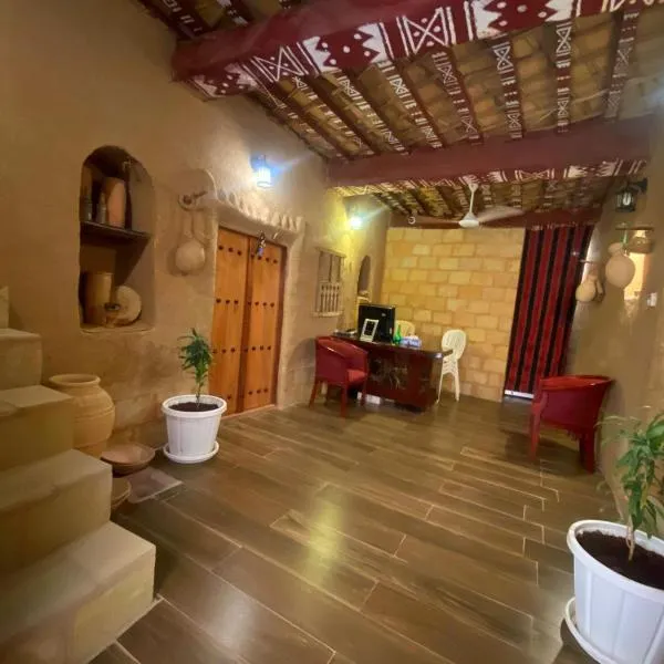 Bait Aljabal Hospitality Inn, ξενοδοχείο σε Al Ḩamrāʼ