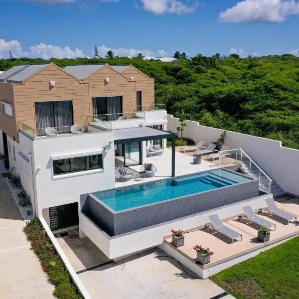 Luxury Villa Beach and Putt avec accès plage, hotell sihtkohas Saint-François