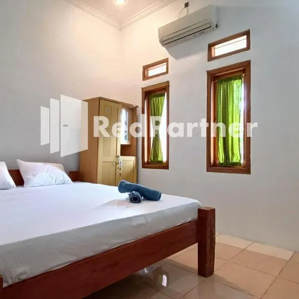 Jogo Segoro Homestay Mitra RedDoorz near Pantai Sundak Gunungkidul, hotel v destinaci Ngandong