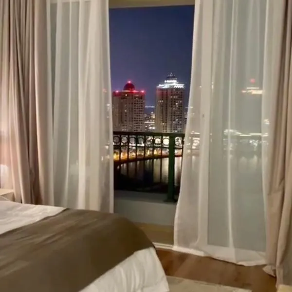 Beachfront Luxury Apartment-Pearl Island شقه مطله على الشاطئ بجزيرة اللؤلؤه, hotel in Doha