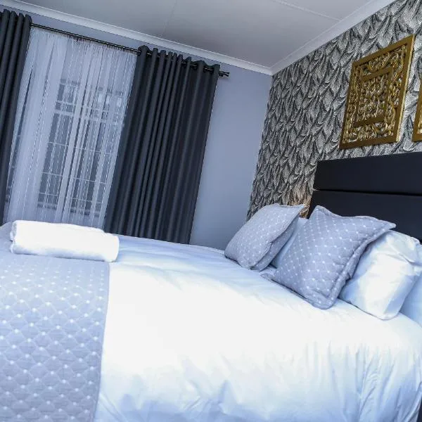 Delux Guesthouse – hotel w mieście Volksrust