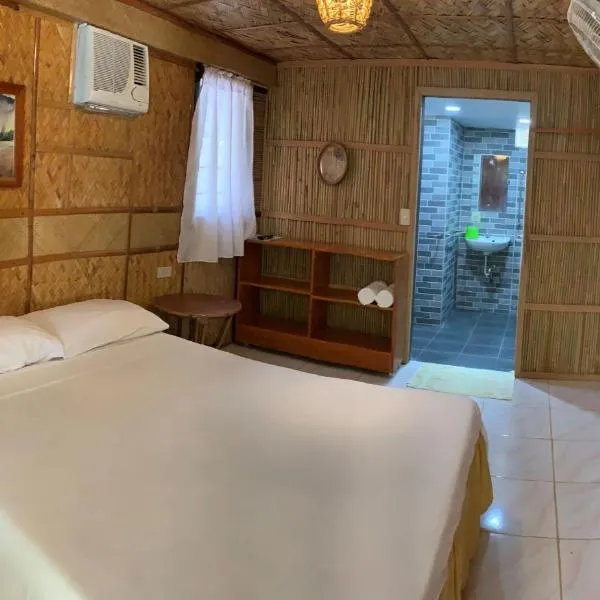 Bamboo House Beach Lodge & Restaurant，位于波尔多·格尼拉的酒店