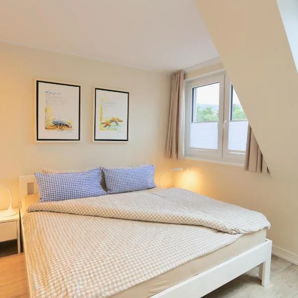 Haus Achterhus 214 - Wohnung 14 "blauer Anker"、ユイストのホテル