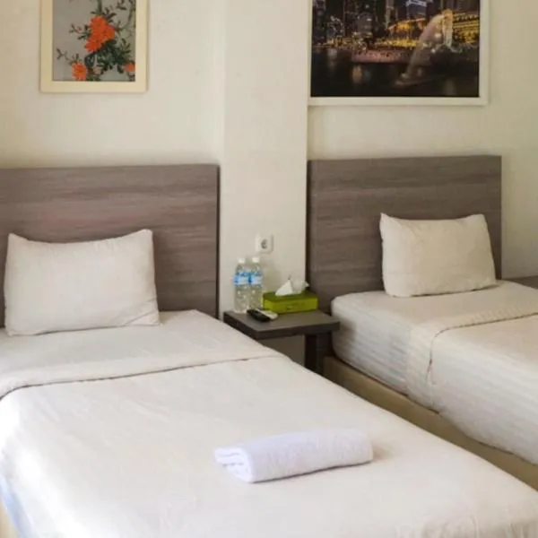 Twospaces Living at Maximus inn, hotel in Palembang