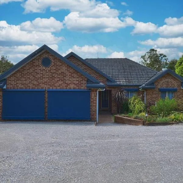 Lilly Pilly Lodge, ξενοδοχείο σε Wallalong