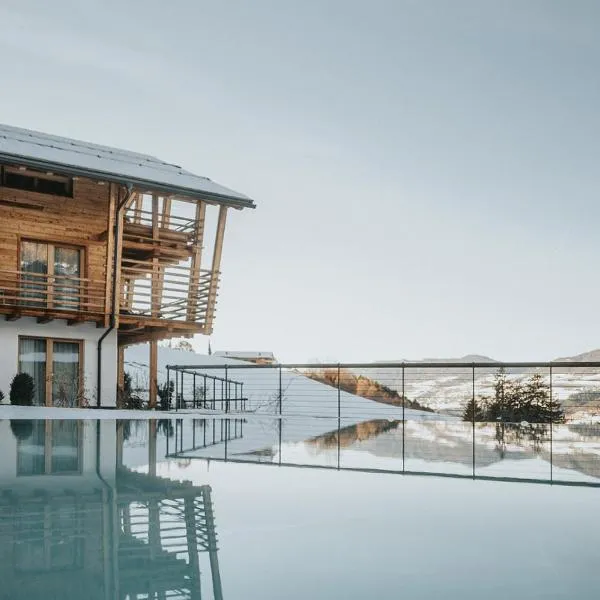 Presulis Hideaway Apartments & Restaurant, hotel v destinaci Fiè